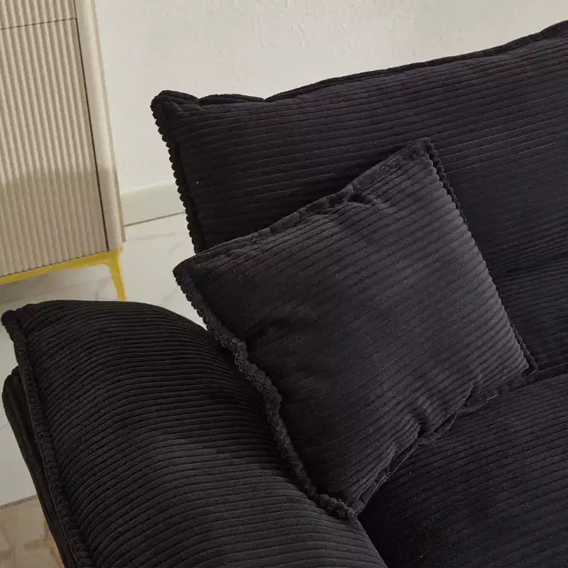 Canapé-lit confortable en velours côtelé avec oreillers