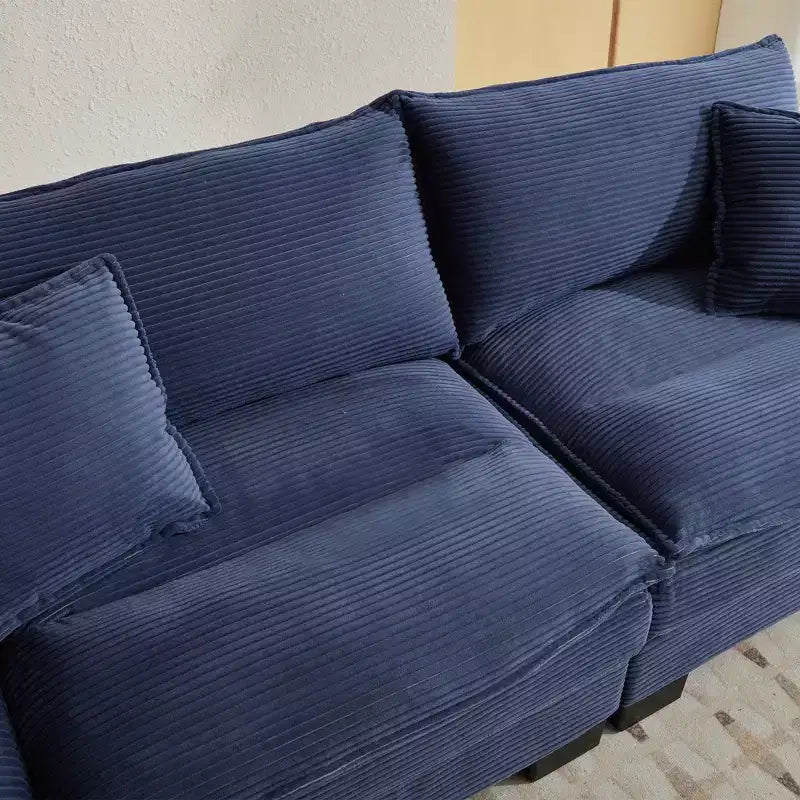 Canapé-lit confortable en velours côtelé avec oreillers