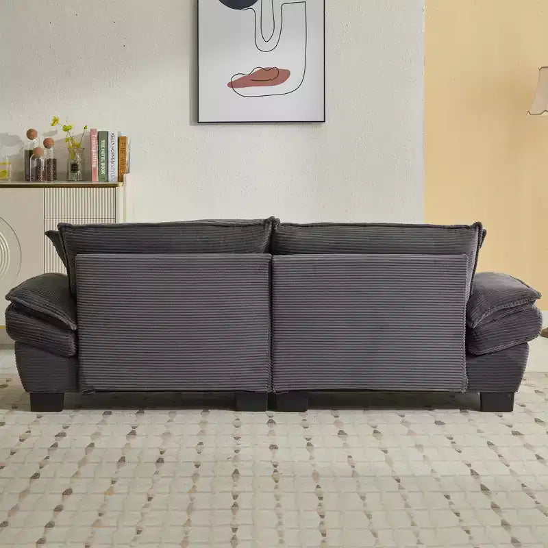 Canapé-lit confortable en velours côtelé avec oreillers