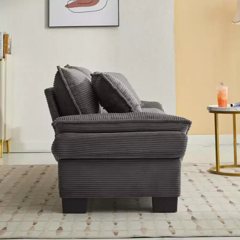 Canapé-lit confortable en velours côtelé avec oreillers