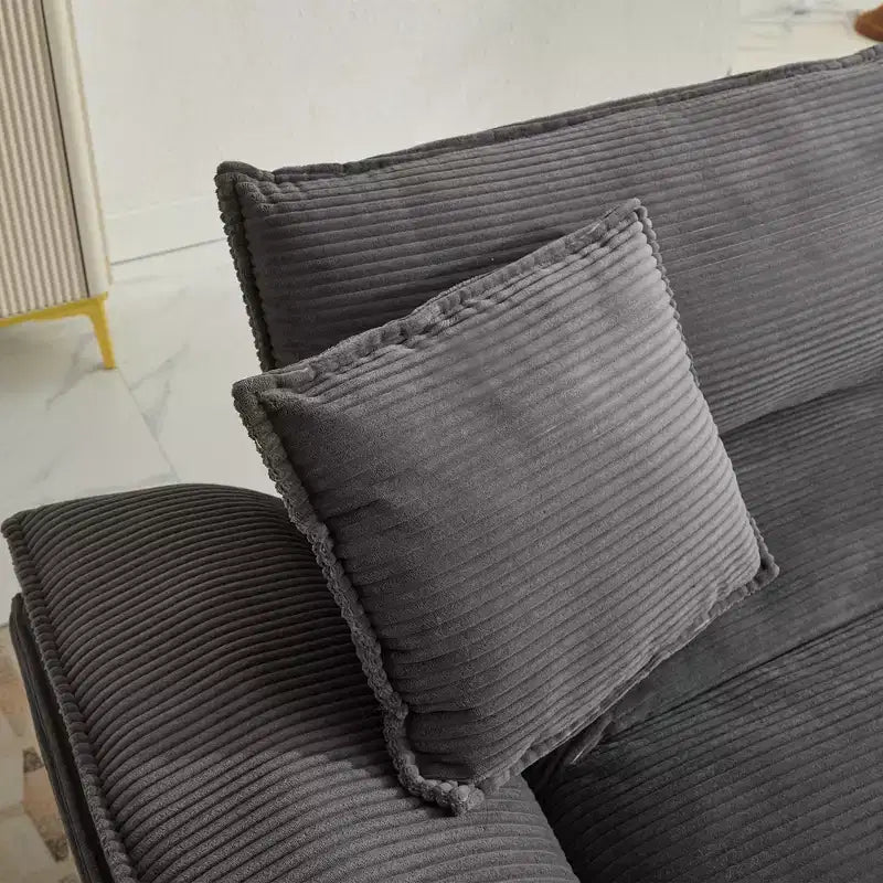 Canapé-lit confortable en velours côtelé avec oreillers