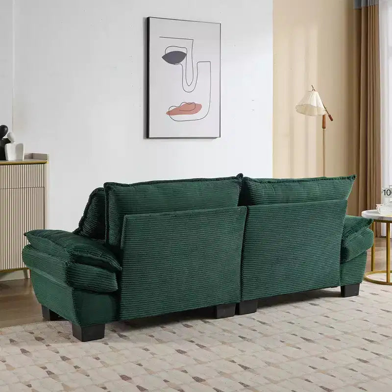 Canapé-lit confortable en velours côtelé avec oreillers