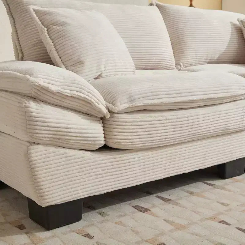 Canapé-lit confortable en velours côtelé avec oreillers