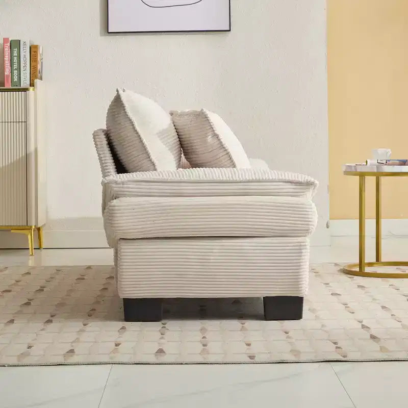 Canapé-lit confortable en velours côtelé avec oreillers