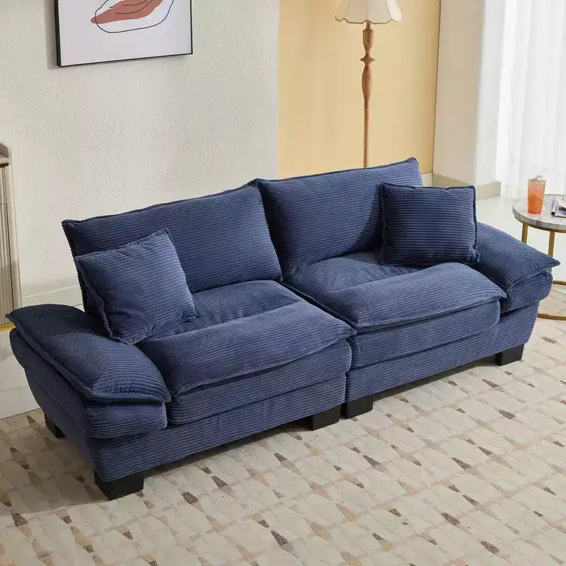 Canapé-lit confortable en velours côtelé avec oreillers