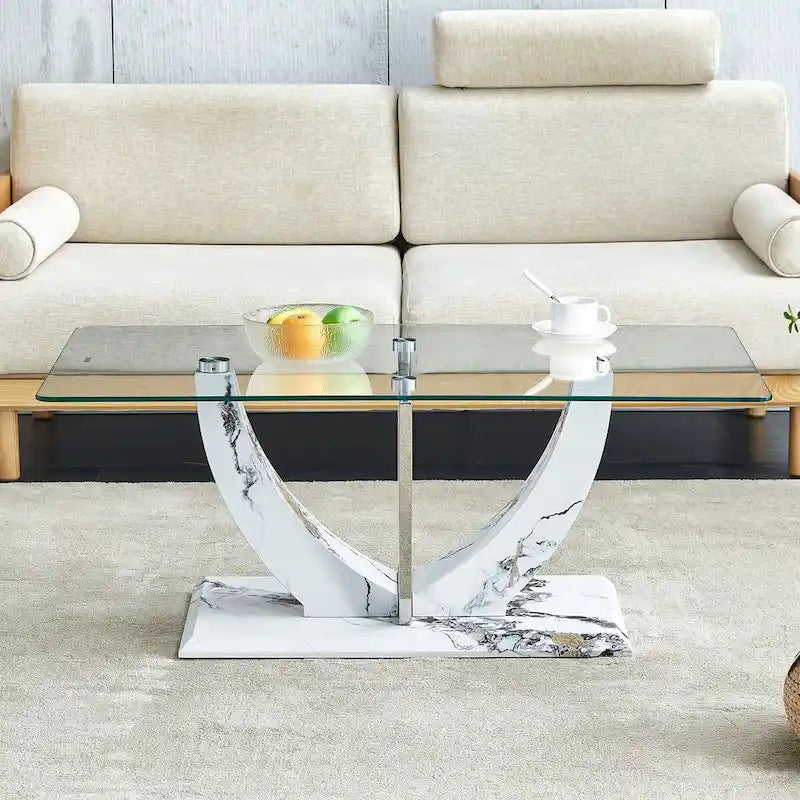 Modern minimalist transparent tempered glass coffee table with marble patterned MDF legs and stainless steel decorative columns